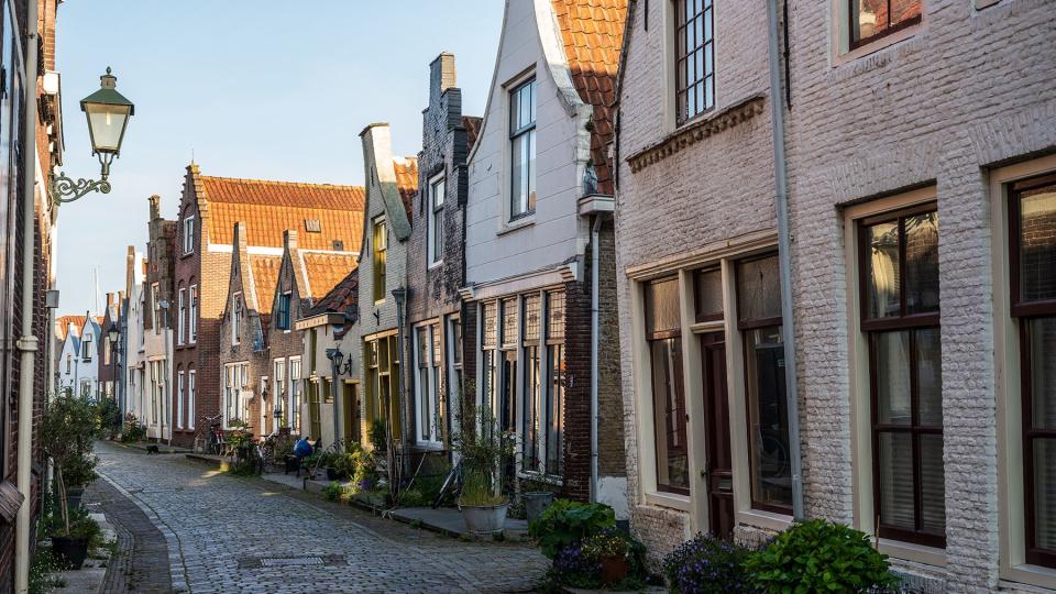 Walking in old Dutch town Zierikzee with old small houses and streets, Zeeland, Netherlands