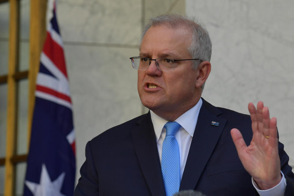 CANBERRA, AUSTRALIA - DECEMBER 11: Prime Minister Scott Morrison reacts during a press conference in the Prime Ministers courtyard on December 11, 2020 in Canberra, Australia. Clinical trials of a COVID-19 vaccine being developed by the University of Queensland in partnership with biotech company CSL will be abandoned, after the Federal Government had committed to purchasing, and agreements had been made to secure 51 million doses of the vaccine. (Photo by Sam Mooy/Getty Images)