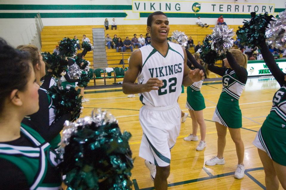 Phoenix Sunnyslope player Royce Woolridge runs out before the start of their high school boys basketball game against Glendale Independence in Phoenix on Friday, January 8, 2010.