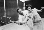 <p>Joan Crawford receives one-on-one instruction from tennis champion Harvey Snodgrass in 1930. </p>