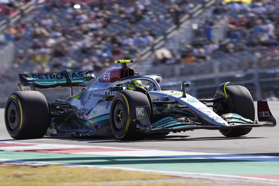 Mercedes driver Lewis Hamilton, of Britain, steers through a turn during the first practice session for the Formula One U.S. Grand Prix auto race at Circuit of the Americas, Friday, Oct. 21, 2022, in Austin, Texas. (AP Photo/Eric Gay)