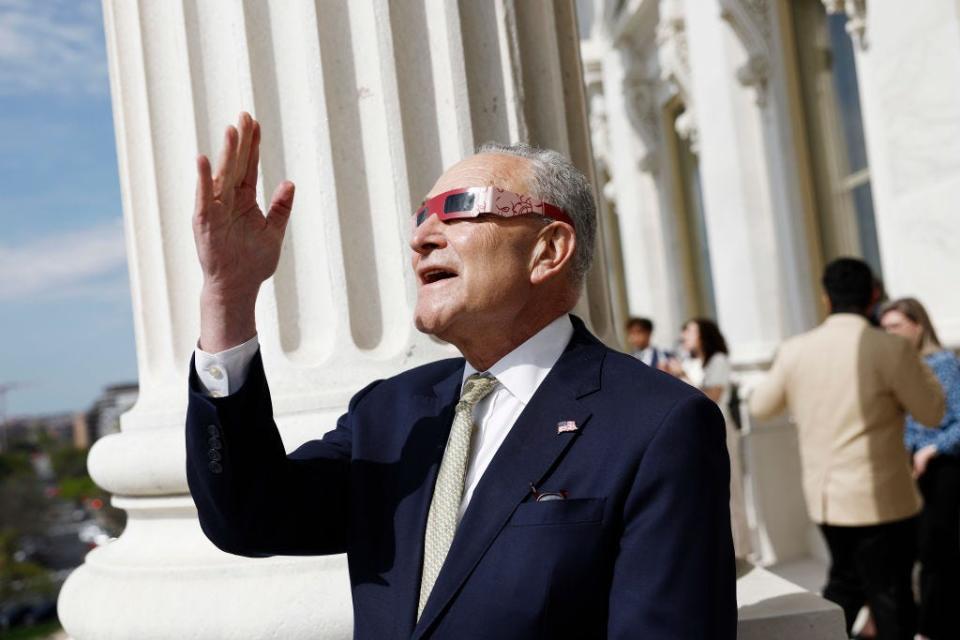 Chuck Schumer views the solar eclipse in April 2024