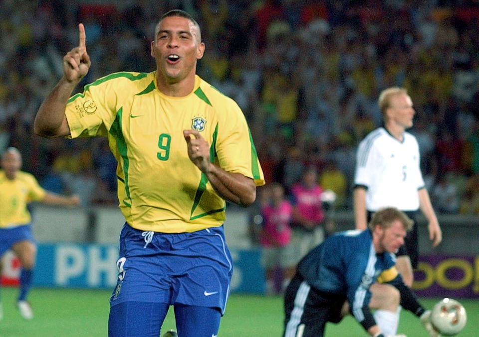 FILE - Brazil's Ronaldo celebrates scoring against Germany during the World Cup final soccer match at the Yokohama stadium in Yokohama, Japan on June 30, 2002. Brazil won the match 2-0 with Ronaldo scoring both goals. . (AP Photo/Dusan Vranic, File)