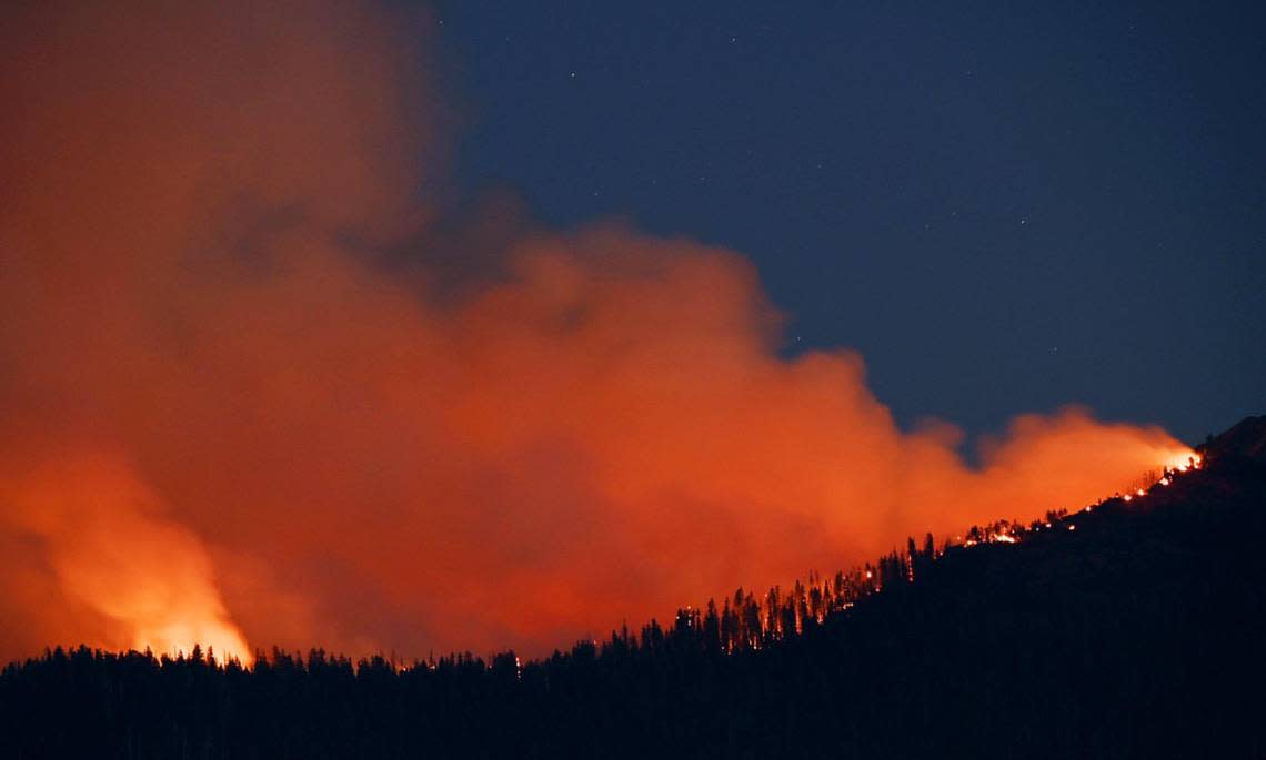 The Washburn Fire burns near the south entrance of Yosemite National Park Monday, July 11, 2022 near Oakhurst.