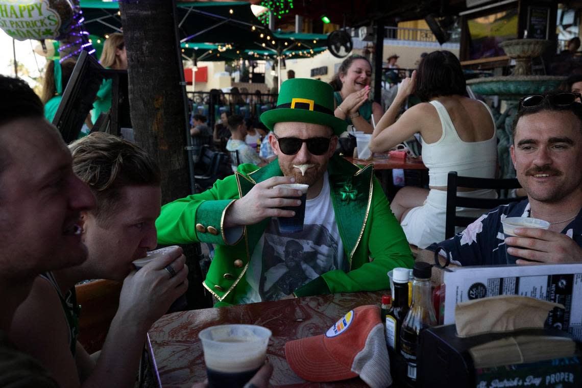Marcus Hide, center, who now lives in Boston, celebrates his bachelor party with his friends from Ireland during spring break and St. Patrick’s Day on Sunday, March 17, 2024, at Finnegan’s Way on Ocean Drive in South Beach.