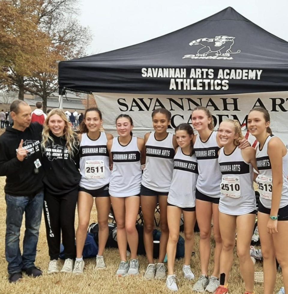 The Savannah Arts girls cross country team after winning the Class 2A state championship.