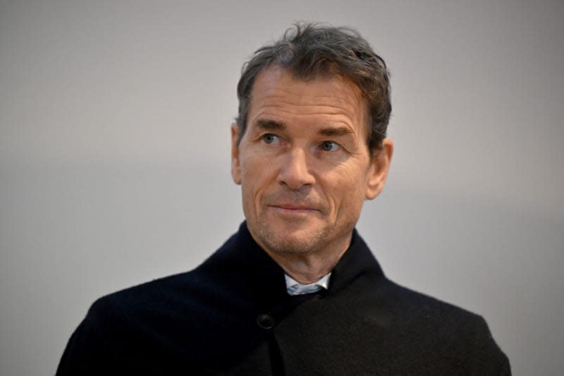 Former Germany and Arsenal goalkeeper Jens Lehmann, accused of trespassing and property damage is seen at Starnberg District Court. Lehmann has been fined by a court in his home town of Starnberg after he attacked a neighbour's garage with a chainsaw. Peter Kneffel/dpa