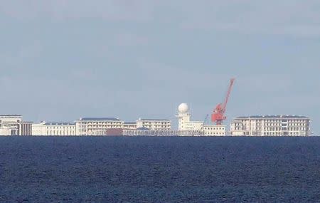 FILE PHOTO: Chinese structures are pictured in Subi Reef at disputed South China Sea, April 21, 2017. REUTERS/Erik De Castro