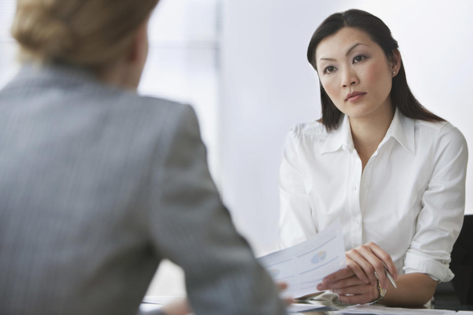 Two people interviewing