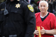 BELLEFONTE, PA - OCTOBER 09: Former Penn State assistant football coach Jerry Sandusky walks into the Centre County Courthouse before being sentenced in his child sex abuse case on October 9, 2012 in Bellefonte, Pennsylvania. Sandusky faces more than 350 years in prison for his conviction in June on 45 counts of child sexual abuse, including while he was the defensive coordinator for the Penn State college football team. (Photo by Patrick Smith/Getty Images)