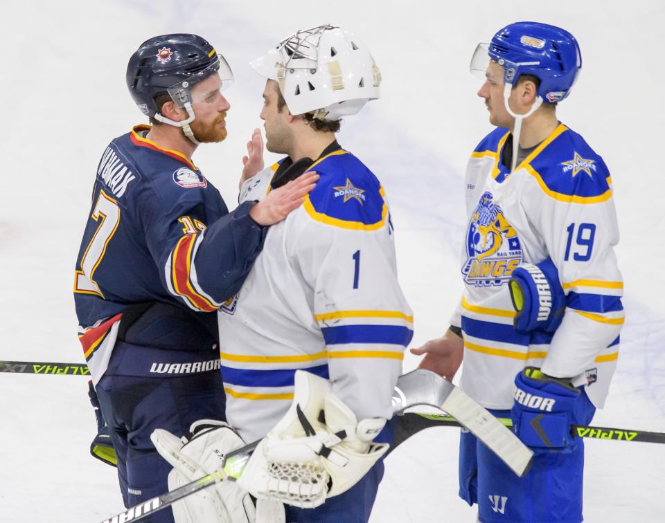 Peoria's Alec Hagaman congratulates Roanoke goaltender Austyn Roudebush, who stopped 37 of 40 shots on goal after Game 3 of the SPHL semifinals Sunday, April 23, 2023 at Carver Arena. The Rivermen fell 5-3 to the Roanoke Rail Yard Dawgs.