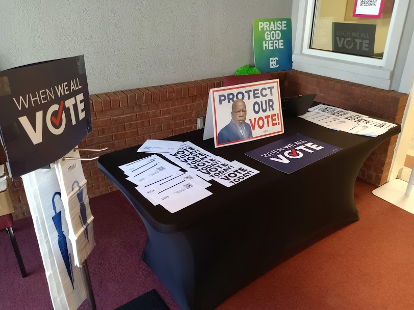 When We All Vote voter registration table set up on church campus.