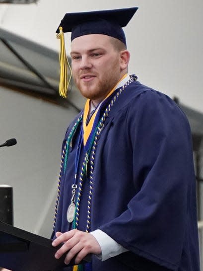 Grant Vermilya, pictured May 8 speaking at Siena Heights University's undergraduate commencement ceremony, is a recipient of Siena Heights University's Outstanding Undergraduate Student Award for 2022.