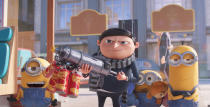 This image released by Universal Pictures shows characters, from left, Stuart, Gru, voiced by Steve Carell, Bob and Kevin in a scene from "Minions: The Rise of Gru." (Illumination Entertainment/Universal Pictures via AP)