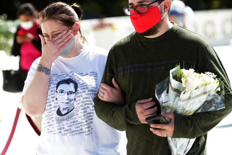 Mourners carried flowers and wore T-shirts hailing the ‘Notorious RBG’.