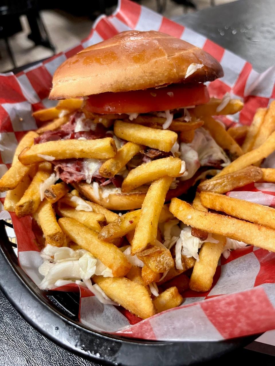 The Pittsburgh-style sandwich at Lelulo's Pizzeria in Cape Coral is piled high with meat, fries and coleslaw.