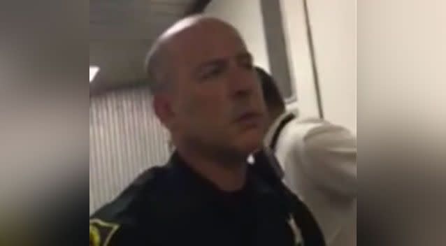 After six minutes of arguing, the Broward County sheriff’s deputies stepped in. Picture: YouTube/Charles Jones