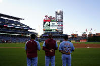 <p>Philadelphia Phillies' players stand before a baseball game against the Miami Marlins for a tribute to Queen Elizabeth II, Britain's longest-reigning monarch who died after 70 years on the throne, Thursday, Sept. 8, 2022, in Philadelphia. (AP Photo/Matt Slocum)</p> 