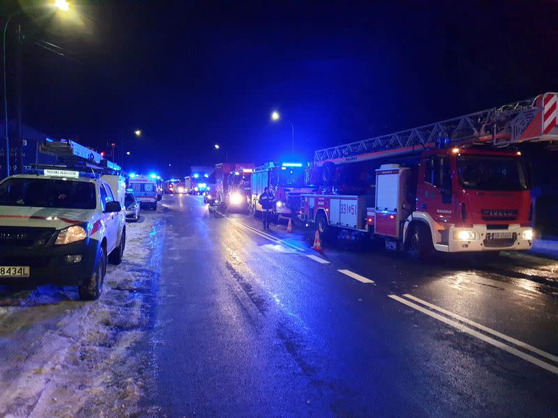 Fire trucks seen at site of building levelled by gas explosion in Szczyrk