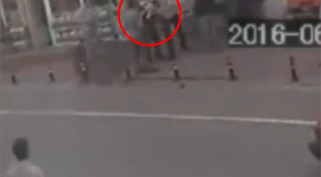 The baby can be seen falling into the arms of Mr Yildiz on grainy CCTV footage. Photo: