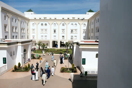 Students walk to attend religious courses at Mohammed VI Institute for training Imams in Rabat, Morocco April 16, 2019. Picture taken through a window. REUTERS/Youssef Boudlal