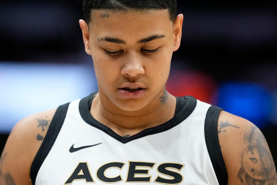 Las Vegas Aces guard Kierstan Bell looks down during the second half of a WNBA game at the Seattle Storm, Saturday, May 20, 2023.