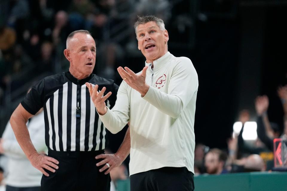 Oklahoma coach Porter Moser questions a call during the first half of the team's NCAA college basketball game against Baylor in Waco, Texas, Tuesday, Feb. 13, 2024. (AP Photo/LM Otero)