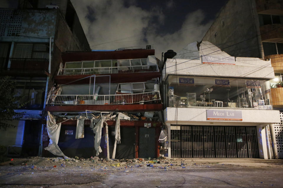 <em>Buildings were left in ruins following the huge quake (AP)</em>