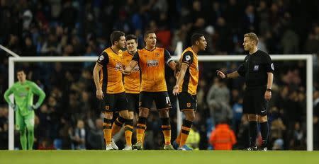 Football Soccer - Manchester City v Hull City - Capital One Cup Quarter Final - Etihad Stadium - 1/12/15 Hull City's Isaac Hayden remonstrates with referee Mike Jones after Manchester City's fourth goal Action Images via Reuters / Andrew Boyers Livepic