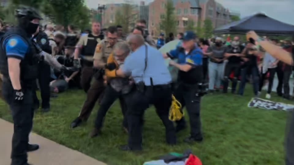Steve Tamari is seen being taken into custody during a demonstration at Washington University in St. Louis. - Courtesy Michael Allen