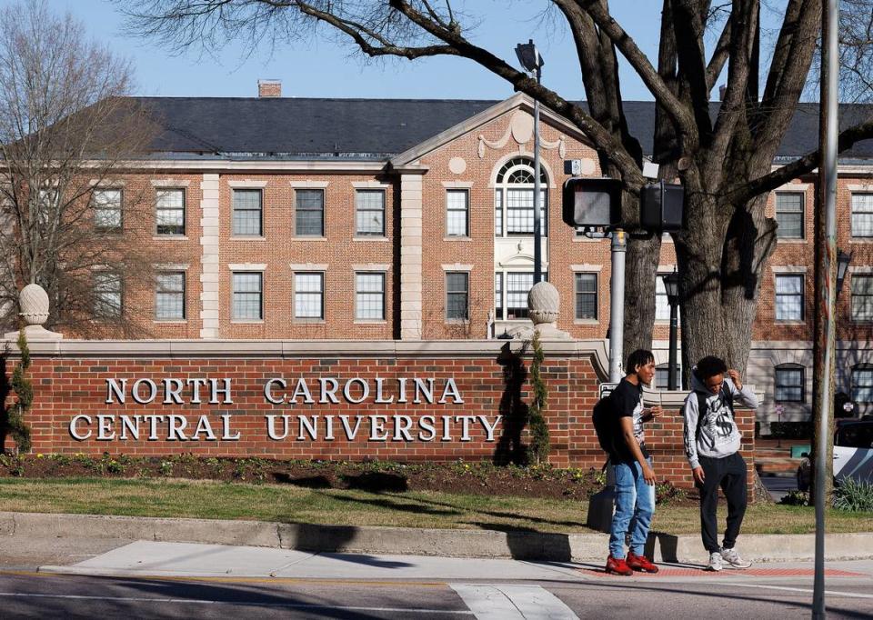 People wait to cross Fayetteville Street on the campus of North Carolina Central University on Tuesday, March 12, 2024, in Durham, N.C.