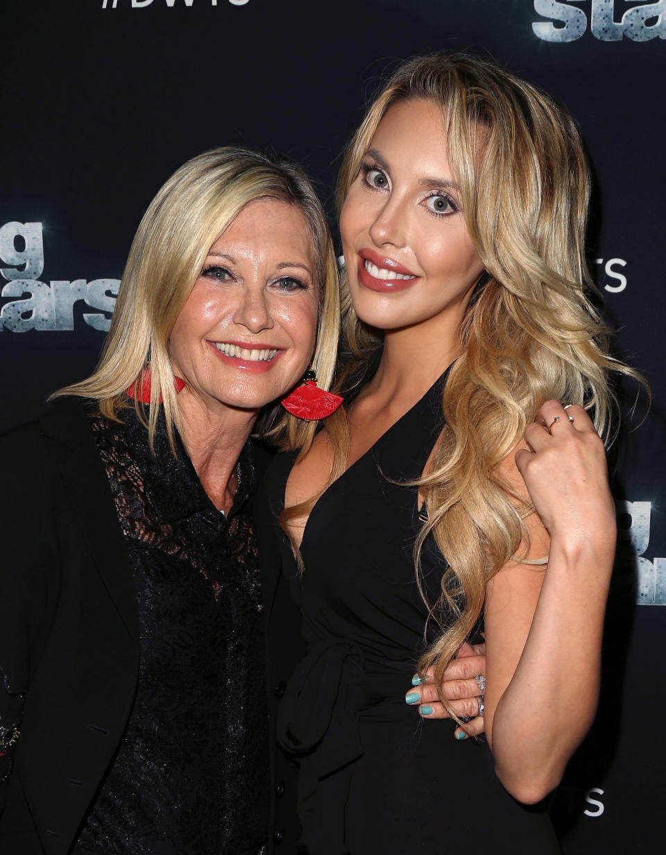 Actress/singer Olivia Newton-John (L) and daughter actress/singer Chloe Lattanzi attend 'Dancing with the Stars' Season 21 at CBS Televison City on October 19, 2015 in Los Angeles, California.  (Photo by David Livingston/Getty Images)