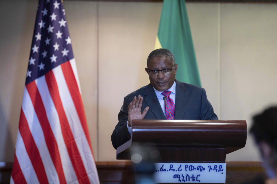 Ethiopian Foreign Minister Gedu Andargachew speaks during a press conference with U.S. Secretary of State Mike Pompeo, at the Sheraton Hotel, in Addis Ababa, Ethiopia, Tuesday, Feb. 18, 2020. America’s top diplomat in his final Africa stop has discussed political reforms with Ethiopia’s Nobel Peace Prize-winning prime minister, and Ethiopia says the U.S. plans to provide “substantial financial support.” (AP Photo/ Mulugeta Ayene)