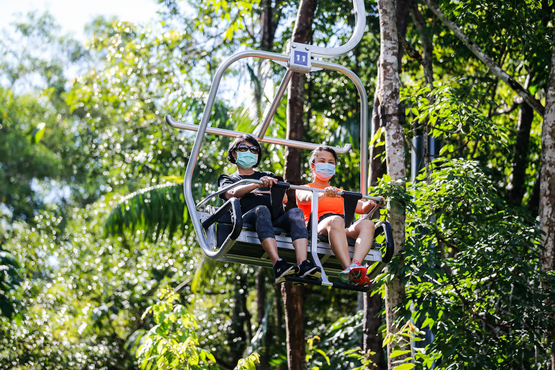 Local tourists enjoy a cable car ride at the Escape Theme Park in George Town June 16, 2020. — Picture by Sayuti Zainudin