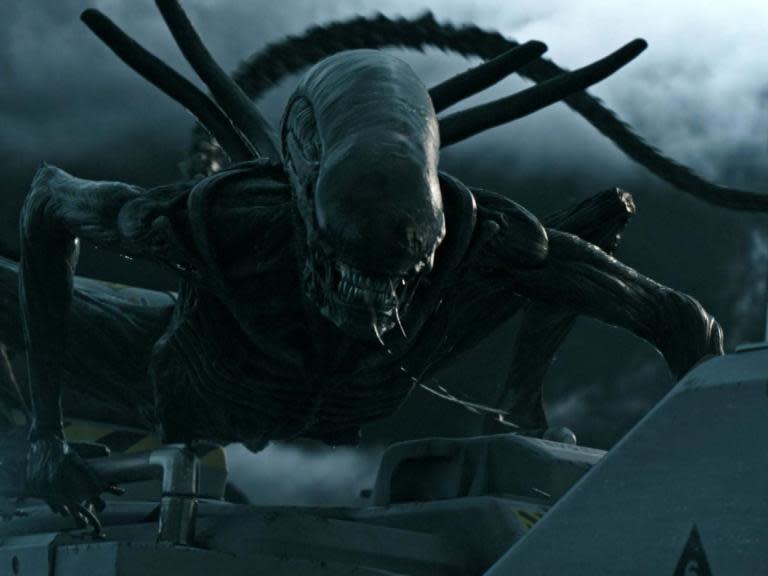 Ridley Scott has revealed that he’s currently working on a sequel to 2017’s Alien: Covenant. In an interview with Scott for Variety, tied with Alien‘s 40th anniversary, it was confirmed that a script for a third prequel – following both Prometheus and Covenant – is currently in development. Scott will once more return to direct. The Alien franchise has come under the ownership of Disney as part of the Fox merger, with the company having already stated that it has plans for more Alien films down the line. Scott also shared an anecdote with The Hollywood Reporter about how the iconic chestburster scene almost went very wrong. He explained that the one-take event almost went awry as cameras were rolling, which would have spoiled the organic reactions he wanted for the cast.“I had four or five cameras running that morning on that set, and there’s power lines, air lines, that will blow blood everywhere,” he said.“I knew once that happens, the white set will be decimated and will take probably two weeks to clean up. So there was no second take. So I positioned everything the way I felt is going to happen, where it was going to come out. And poor John Hurt was lying strapped down on the table under an artificial chest. And we shot and I honestly had to cross my fingers.”Scott yelled, “Action!”, but quickly realised something was terribly wrong.“The T-shirt didn’t open,” he said. “All there is, is this bump in the T-shirt that flashes out and then it goes away. So I scream, ‘Cut! Cut! Cut! Cut! Cut!’ And all the actors start laughing, but they’re kind of nervous because they haven’t seen it.“I go back and say, ‘Clear the set!’ They all go off the set. I crawl in on top of John Hurt — poor bugger lying there — and I’m razor-blading the T-shirt so it will pop when the alien hits the back of the T-shirt. We went again. And it was perfect.”In his tribute to Alien, The Independent’s critic Ed Cumming wrote how the original is ”still the most gripping sci-fi horror ever made“.