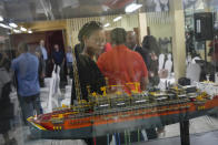 A small scale model of the Fpso Liza Destiny oil drilling ship is on display during the inauguration of a permanent exhibit by ExxonMobil Oil at the Guyana National Museum in Georgetown, Guyana, Thursday, April 20, 2023. While infrastructure projects have created jobs, it’s rare for Guyanese to work directly in the oil industry, as the work to dig deep into the ocean floor is highly technical, and the country doesn't offer such training. (AP Photo/Matias Delacroix)