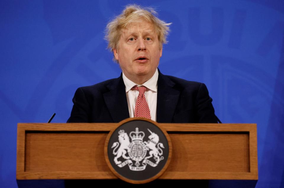 Britain's Prime Minister Boris Johnson speaks during a press conference to outline the Government's new long-term Covid-19 plan, inside the Downing Street Briefing Room in central London on February 21, 2022. - British Prime Minister Boris Johnson has announced that the legal requirement to self-isolate following a positive Covid test in England would end on Thursday as part of a ramping down of rules. (Photo by Tolga Akmen / various sources / AFP) (Photo by TOLGA AKMEN/AFP via Getty Images)