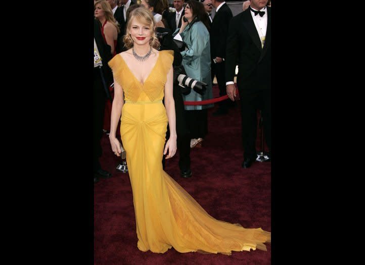 78th Annual Academy Awards, 2006  With one mustard-hued Vera Wang dress, Michelle planted herself firmly in high-fashion territory. Not only was this exquisite Oscar look the best of the night, it was easily one of the best Oscar looks of all time. 