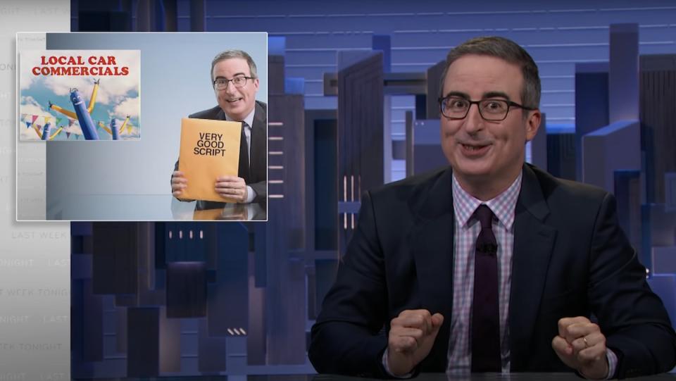 John Oliver on Last Week Tonight at his desk with a box insert showing him at his desk on a previous show holding a manilla folder