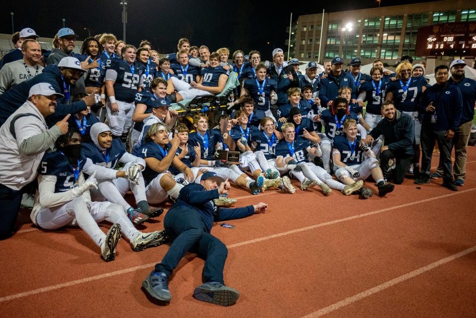 The Central Valley Christian team poses for a photo after beating Los Gatos 45-42 in the CIF State Football Championship at Pasadena City College in Pasadena CA on Saturday, Dec. 09, 2023.
