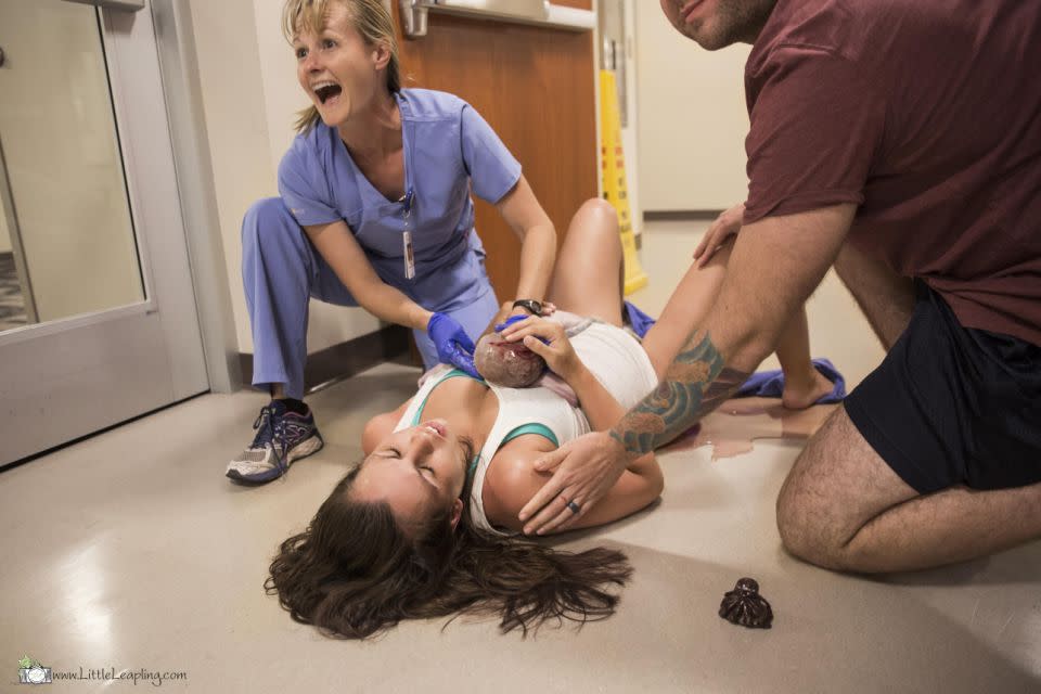 Travis got to cut the babies cord as well. Photo: Little Leapling Photography