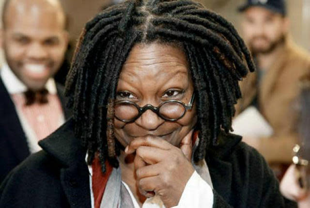 Whoopi Goldberg movies and tv shows from throughout her critically acclaimed career. Pictured: A close up shot of Goldberg looking to the side and smiling. | 