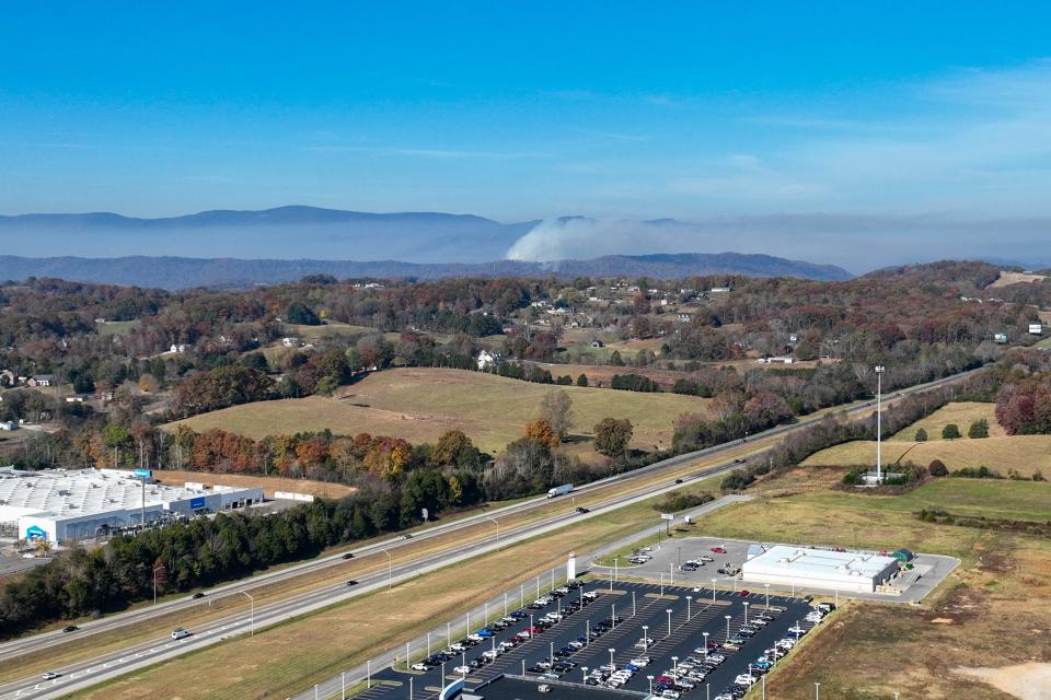Aerial view from the Clinton exit on I-75 of the fire near Rocky Top, TN on Monday, November 6, 2023.