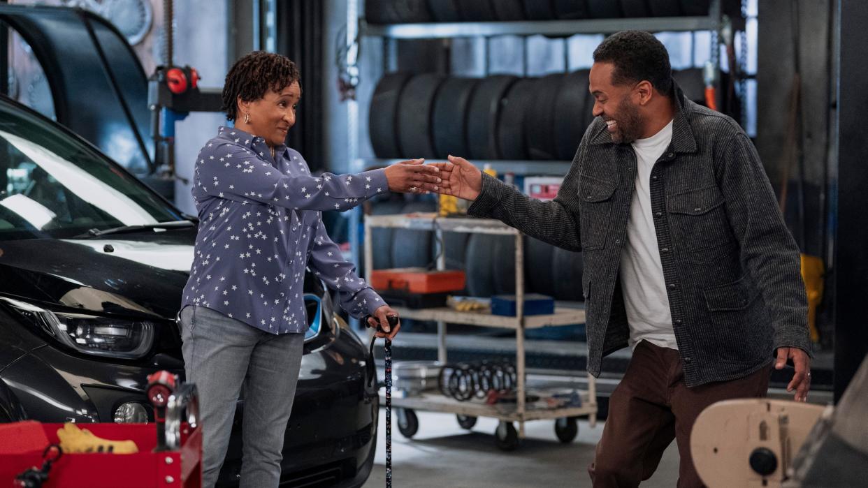  Wanda Sykes as Lucretia and Mike Epps as Bennie laughing in The Upshaws season 5. 