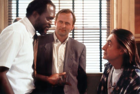 John Grisham with Samuel L. Jackson and director Joel Schumacher on the set of <i>A Time to Kill</i>.<span class="copyright">Alamy</span>