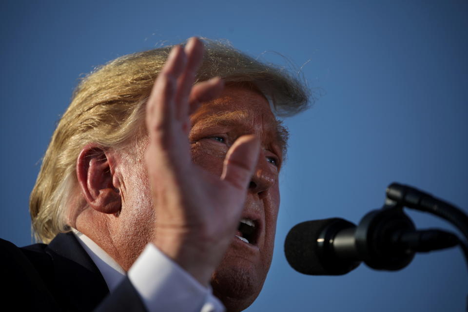 U.S. President Donald Trump speaks during a campaign rally at Tucson International Airport in Tucson, Arizona, U.S., October 19, 2020. REUTERS/Carlos Barria     TPX IMAGES OF THE DAY