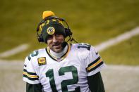 Green Bay Packers' Aaron Rodgers smiles as he is interviewed after an NFL football game against the Chicago Bears Sunday, Jan. 3, 2021, in Chicago. The Packers won 35-16. (AP Photo/Charles Rex Arbogast)