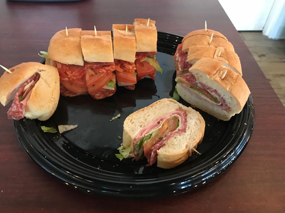 Russo's Authentic Italian Deli and Cafe was providing free samples from its Italian sandwiches at Monday's restaurant opening on Plainfield Road in Crest Hill. Image via John Ferak/Patch