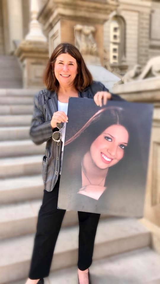 Alicia Stillman holds a picture of her daughter, Emily, who died from bacterial meningitis at age 19 in 2013. Stillman now advocates for organ donation and raises awareness about the meningitis B vaccine.