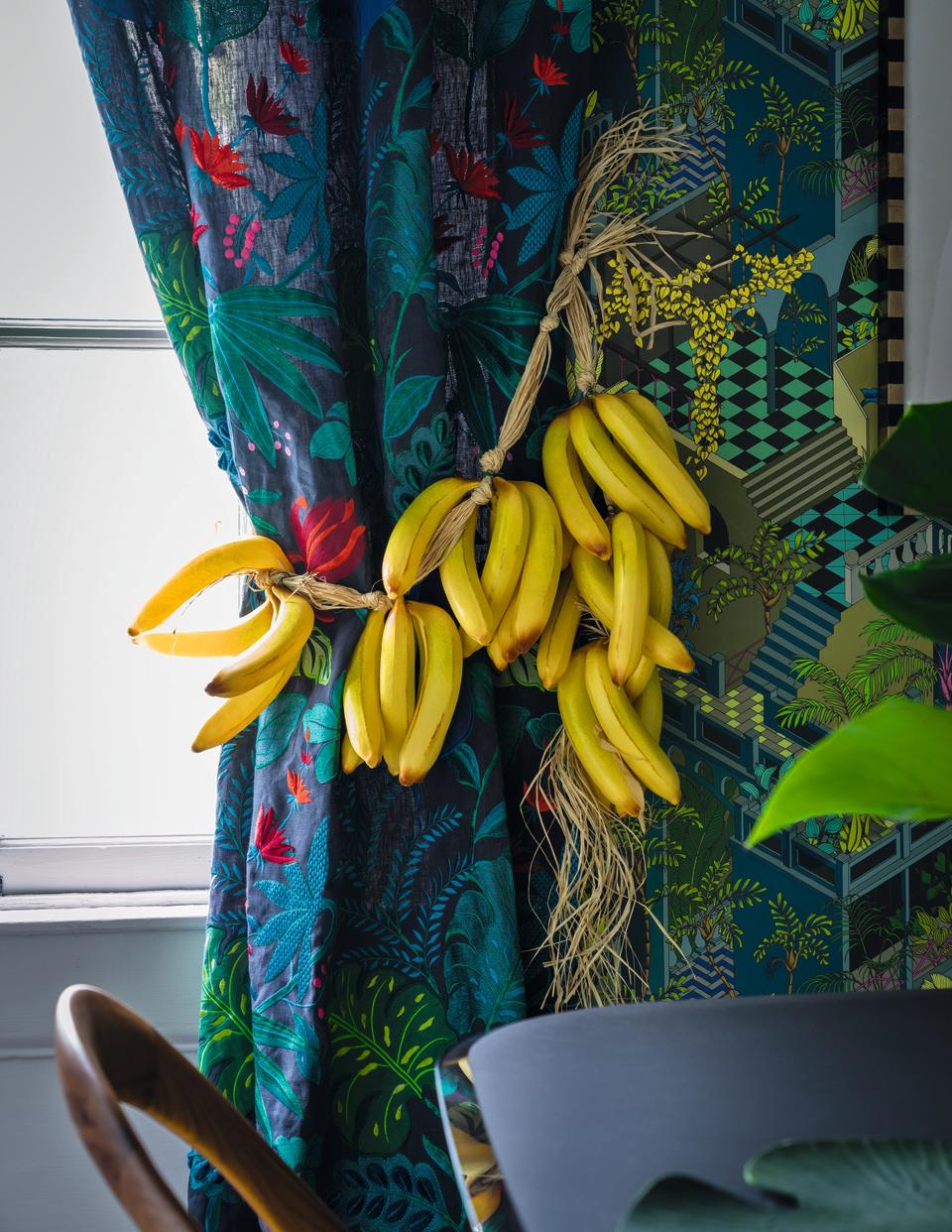 A living room with tropical prints